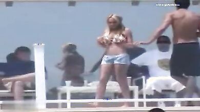 Lindsay Lohan Relaxing In Bikini And Shorts On A Beach