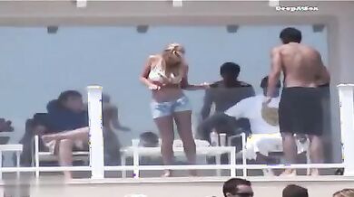 Lindsay Lohan Relaxing In Bikini And Shorts On A Beach