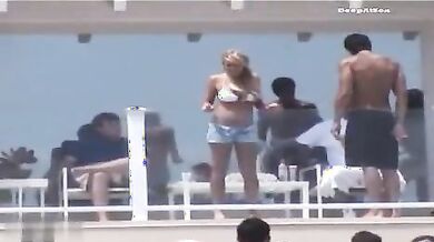 Lindsay Lohan Relaxing In Bikini And Shorts On A Beach